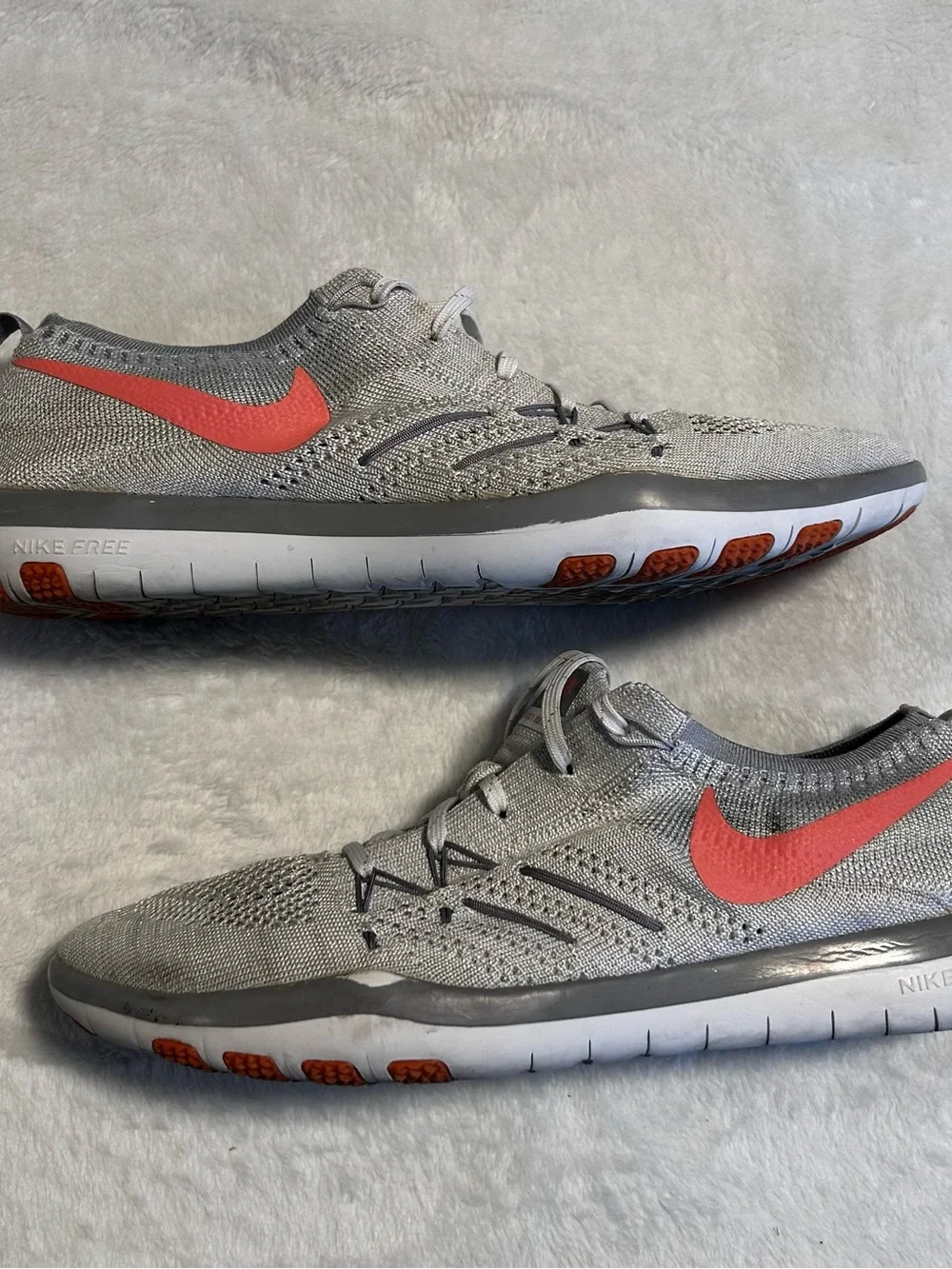 Nike Men's Gray Knit Running Shoes with Coral Accents